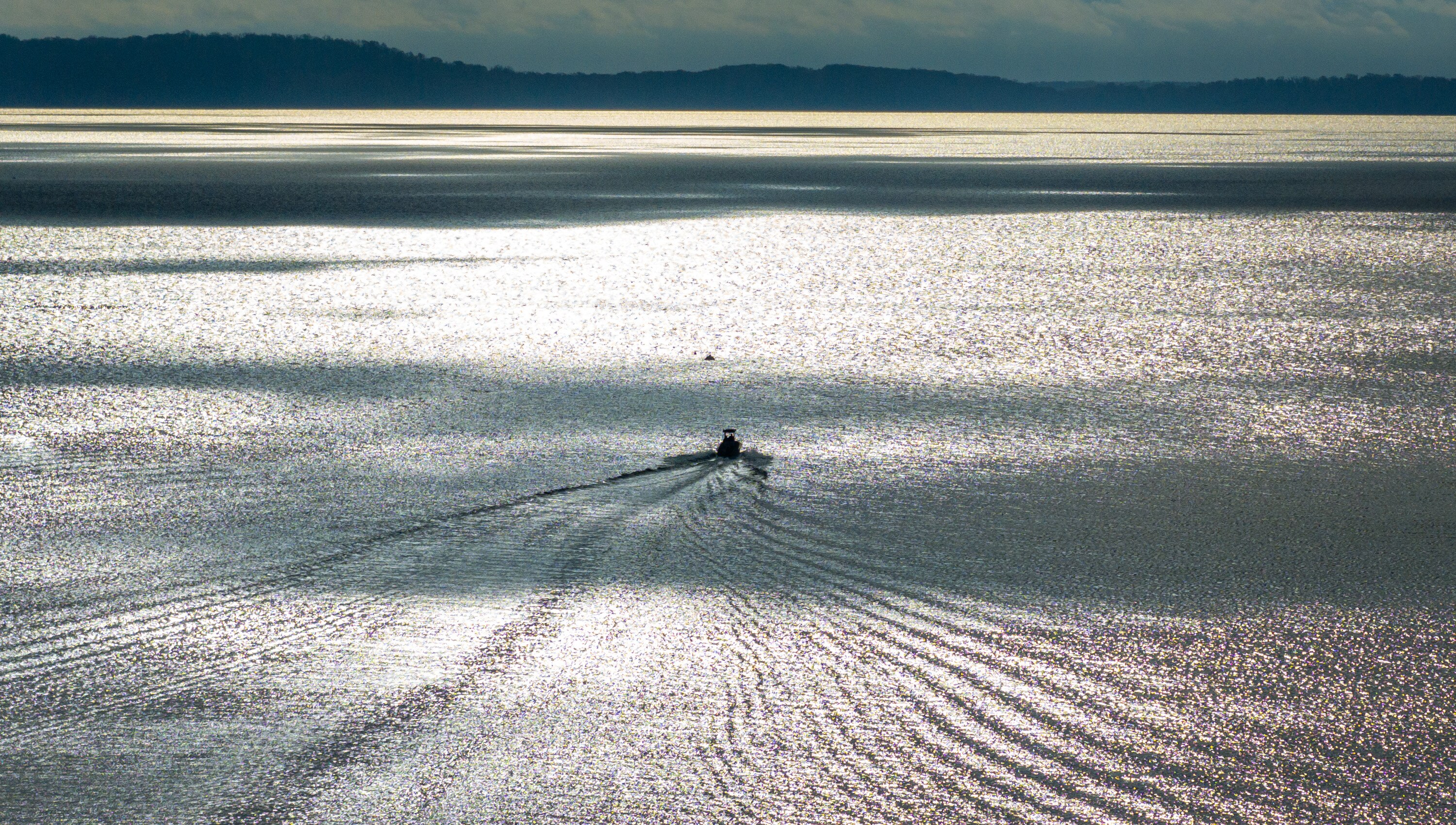 A boater heads out toward the Chesapeake Bay at the Susquehanna Flats.