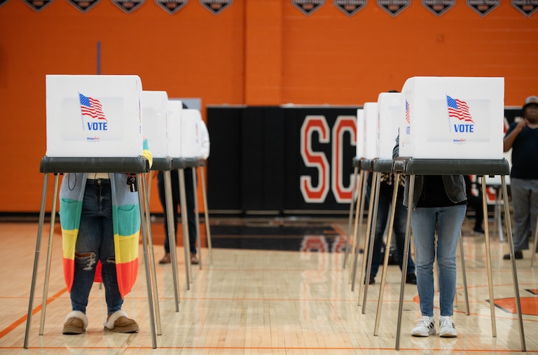 Howard County Voters complete their ballots within the gymnasium at Oakland Mills High School in Columbia, MD on November 5th, 2024.