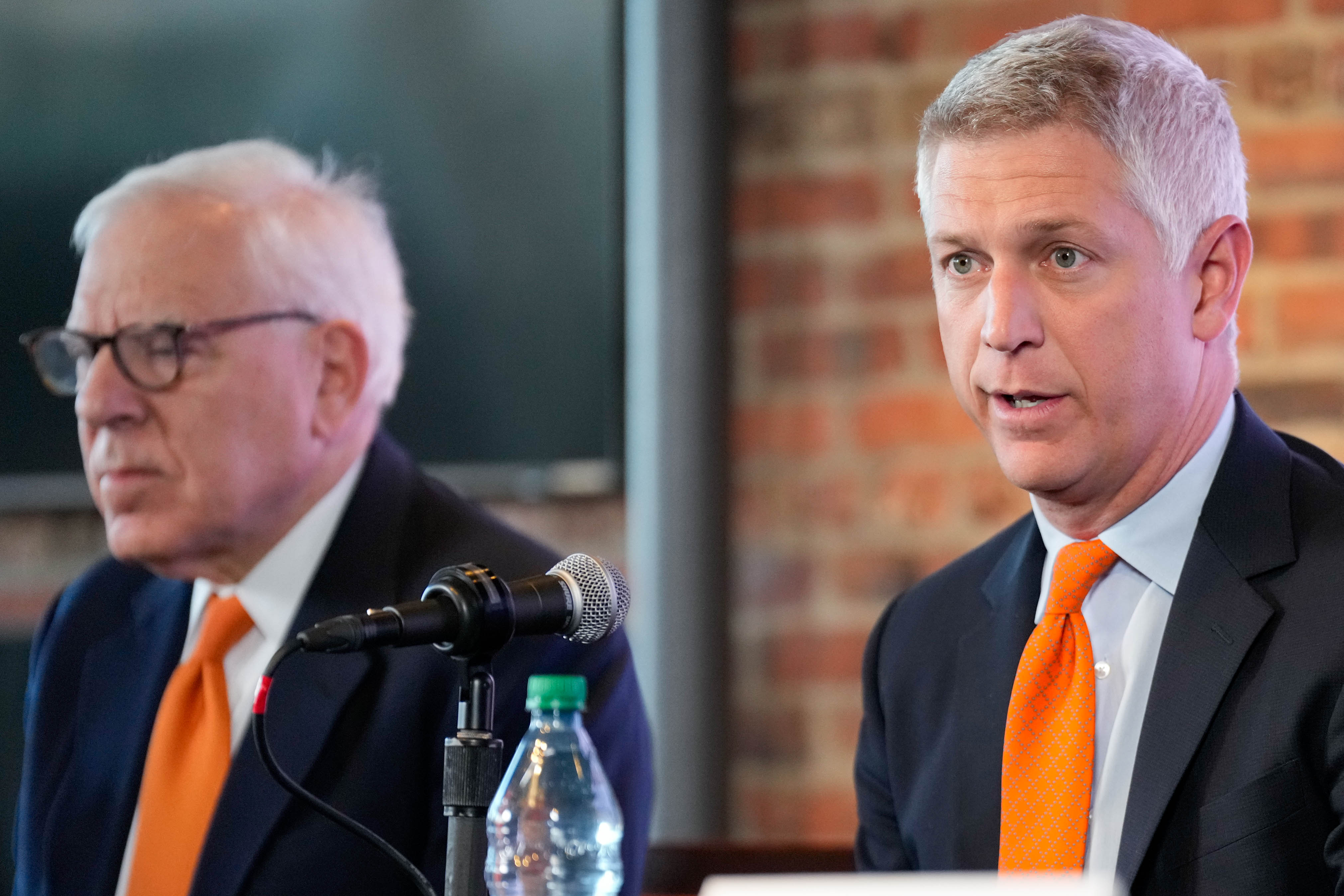 Orioles president of baseball operations Mike Elias, right, flanked by principal owner David Rubenstein, gives remarks during a December news conference to introduce first baseman Pete Alonso.