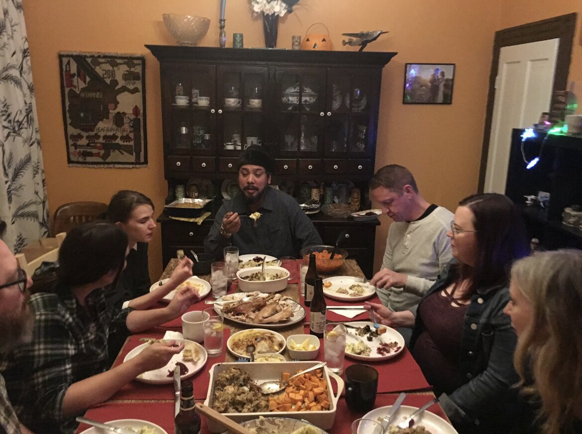The family of Banner reader Jason Molidot gather for Thanksgiving to eat copper pennies, seen in the far right corner.