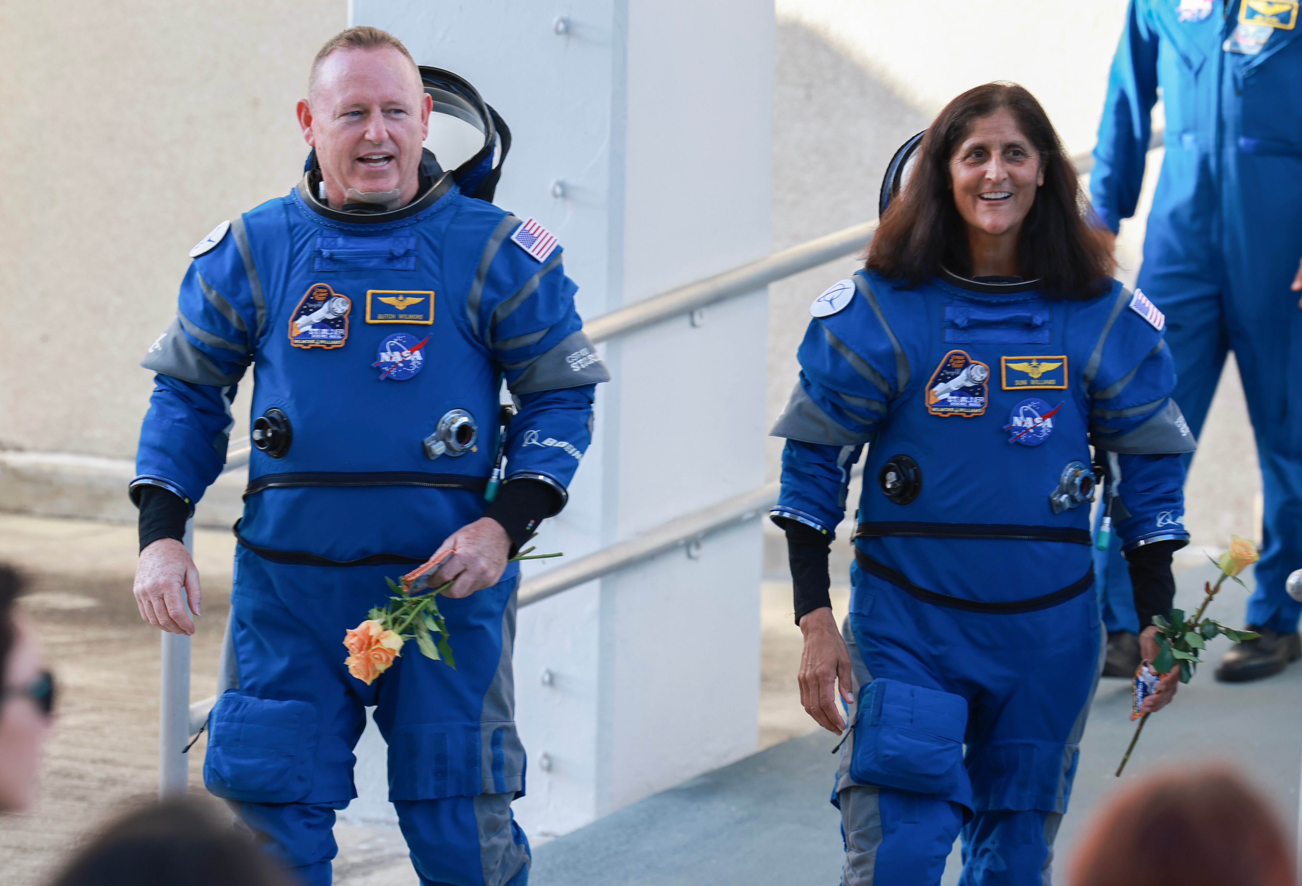 CAPE CANAVERAL, FLORIDA - JUNE 05:  NASA’s Boeing Crew Flight Test Commander Butch Wilmore (L) and Pilot Suni Williams walk out of the Operations and Checkout Building on June 05, 2024 in Cape Canaveral, Florida. The astronauts are heading to Boeing’s Starliner spacecraft, which sits atop a United Launch Alliance Atlas V rocket at Space Launch Complex 41 for NASA’s Boeing crew flight test to the International Space Station.  (Photo by Joe Raedle/Getty Images)