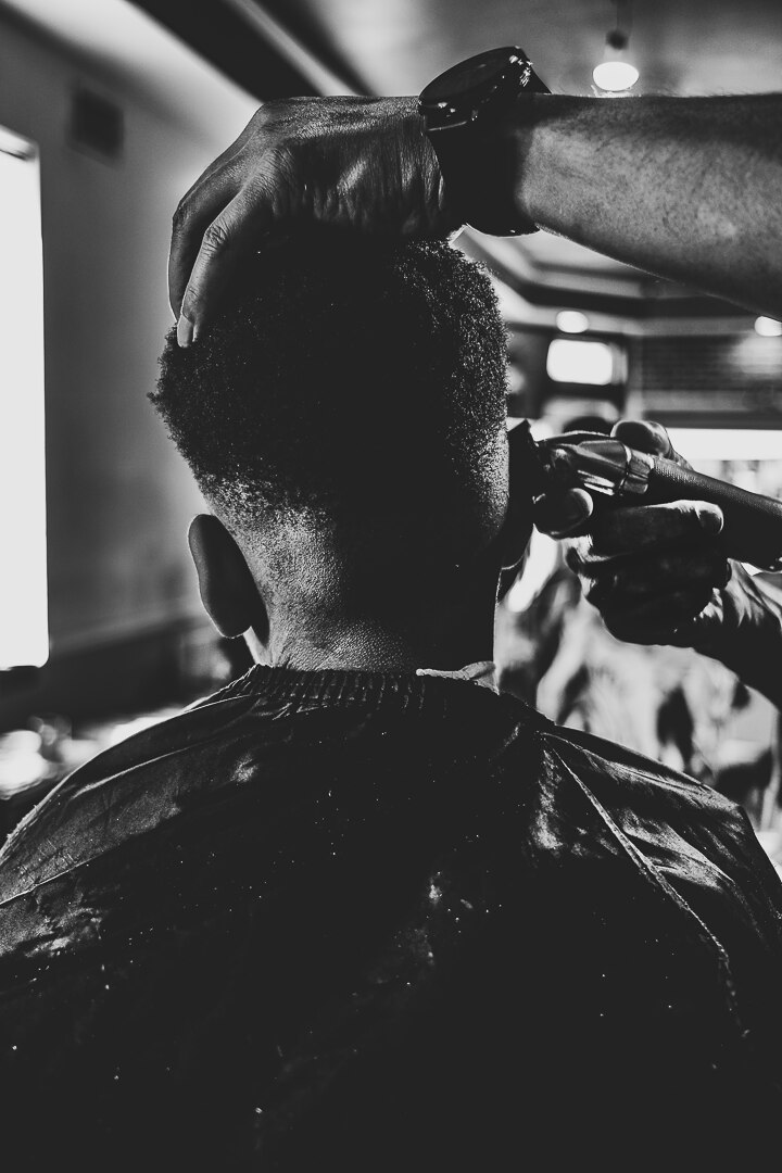 Wallace Lane getting a haircut.