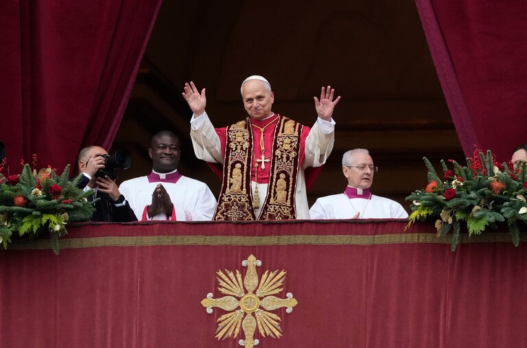 Pope Leo XIV waves after delivering the Urbi et Orbi (Latin for 'to the city and to the world' ) Christmas' day blessing from the main balcony of St. Peter's Basilica at the Vatican, Thursday, Dec. 25, 2025.