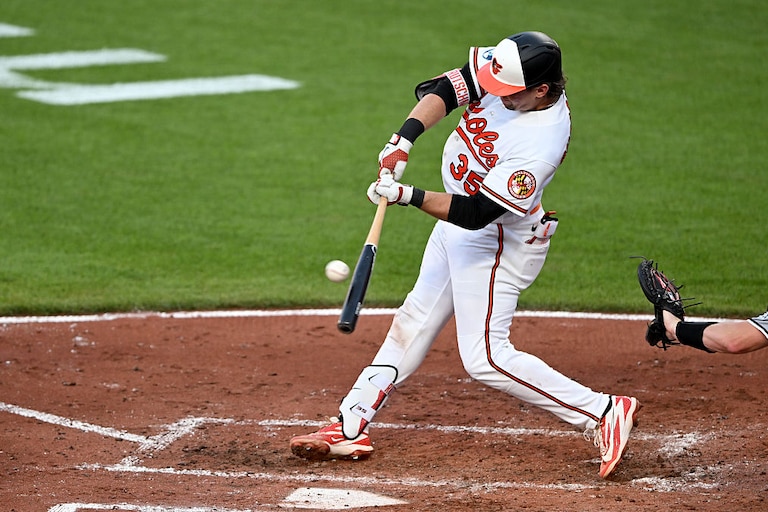 Orioles catcher Adley Rutschman drives in a run with a sacrifice fly in the third inning against the Chicago White Sox.