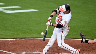 Orioles catcher Adley Rutschman drives in a run with a sacrifice fly in the third inning against the Chicago White Sox.