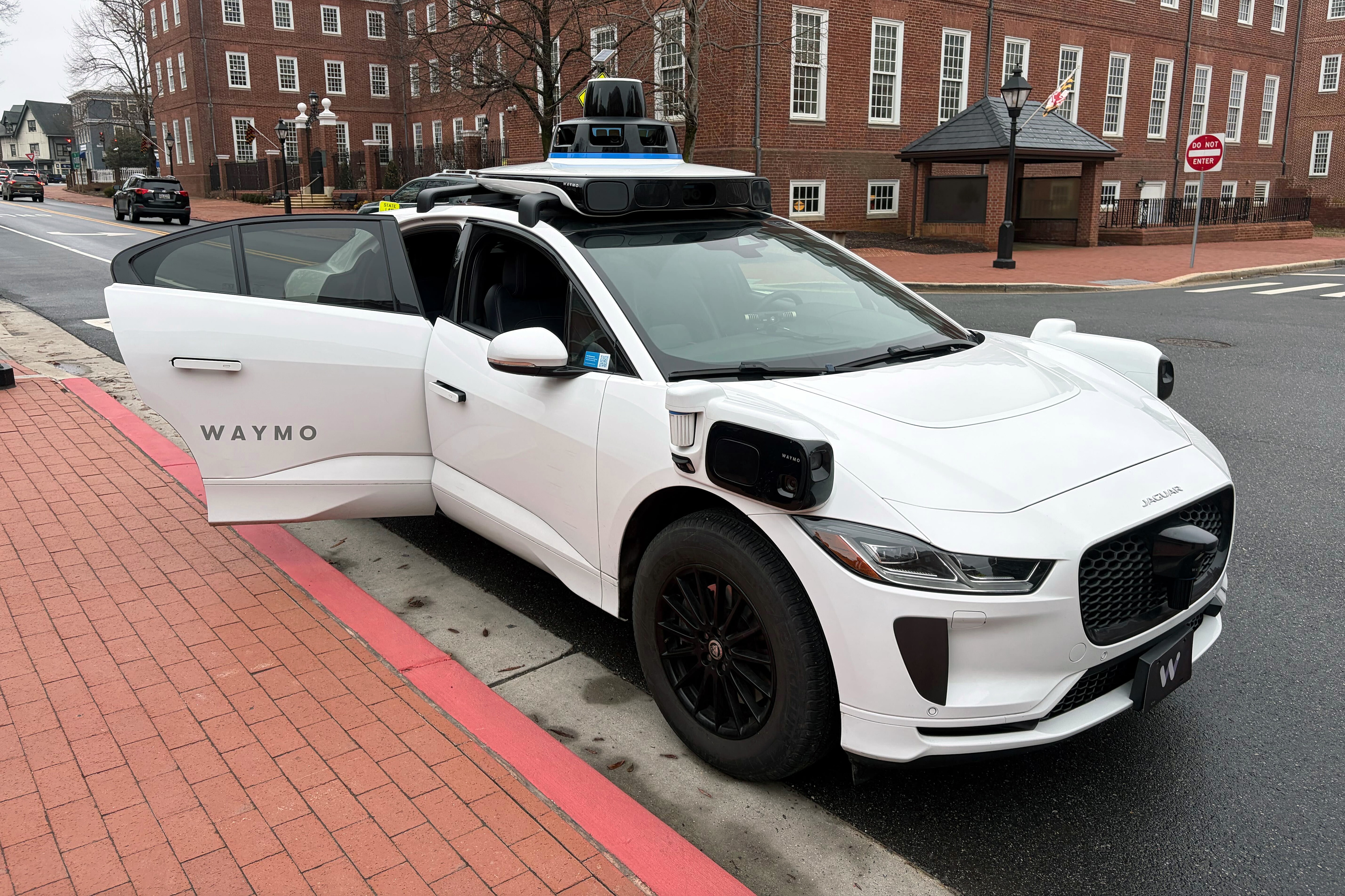 March 4, 2026 - A Waymo vehicle is parked outside the Maryland State House.