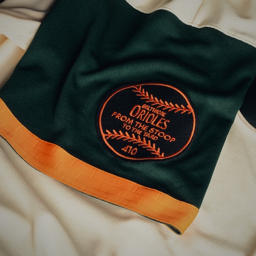 The Baltimore Orioles’ new City Connect uniforms feature green sleeves, matching the seats and an historic “B” logo that stems from the 1890s Baltimore Baseball Club.