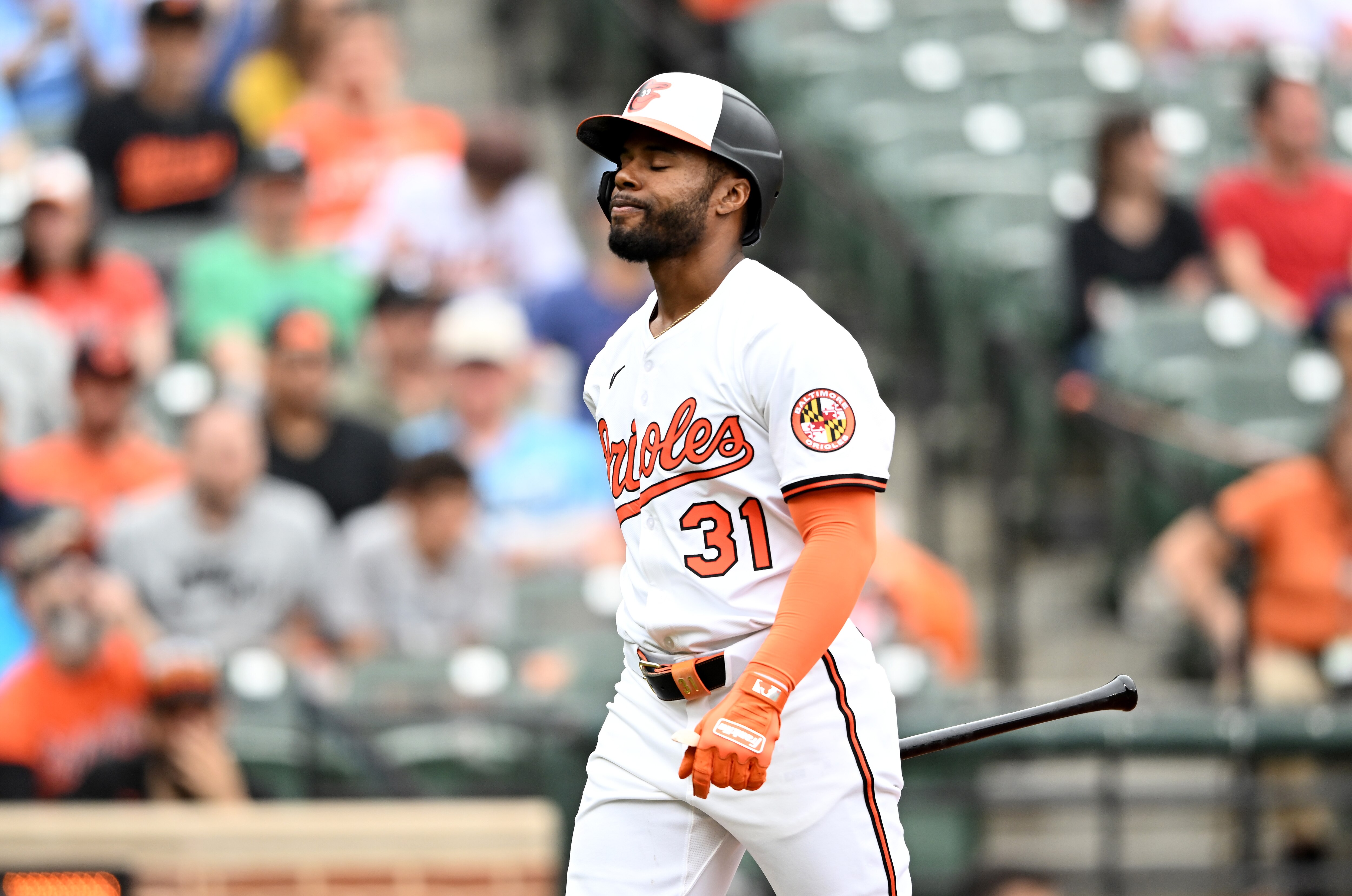 Cedric Mullins returns to the dugout after striking out.