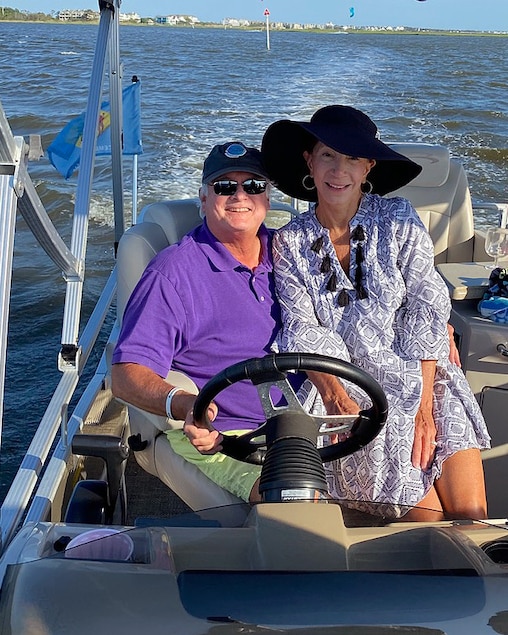 Jeff Wright with his wife Denise driving his pontoon boat in Bethany Beach, DE. in summer of 2022. Bethany Beach was his happy place.