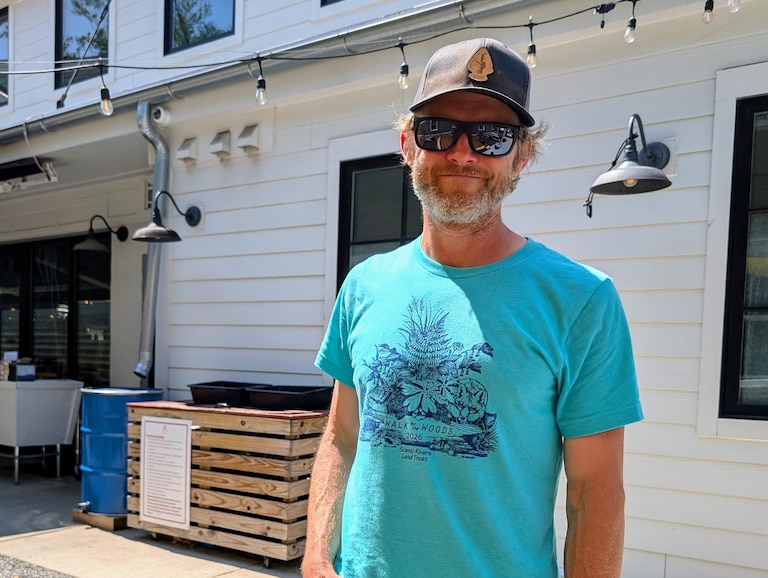 When city officials asked Cam Bowdren how he would enforce the ban on eating while standing at Forward Brewing, he decided to stencil the law on his outdoor tables.