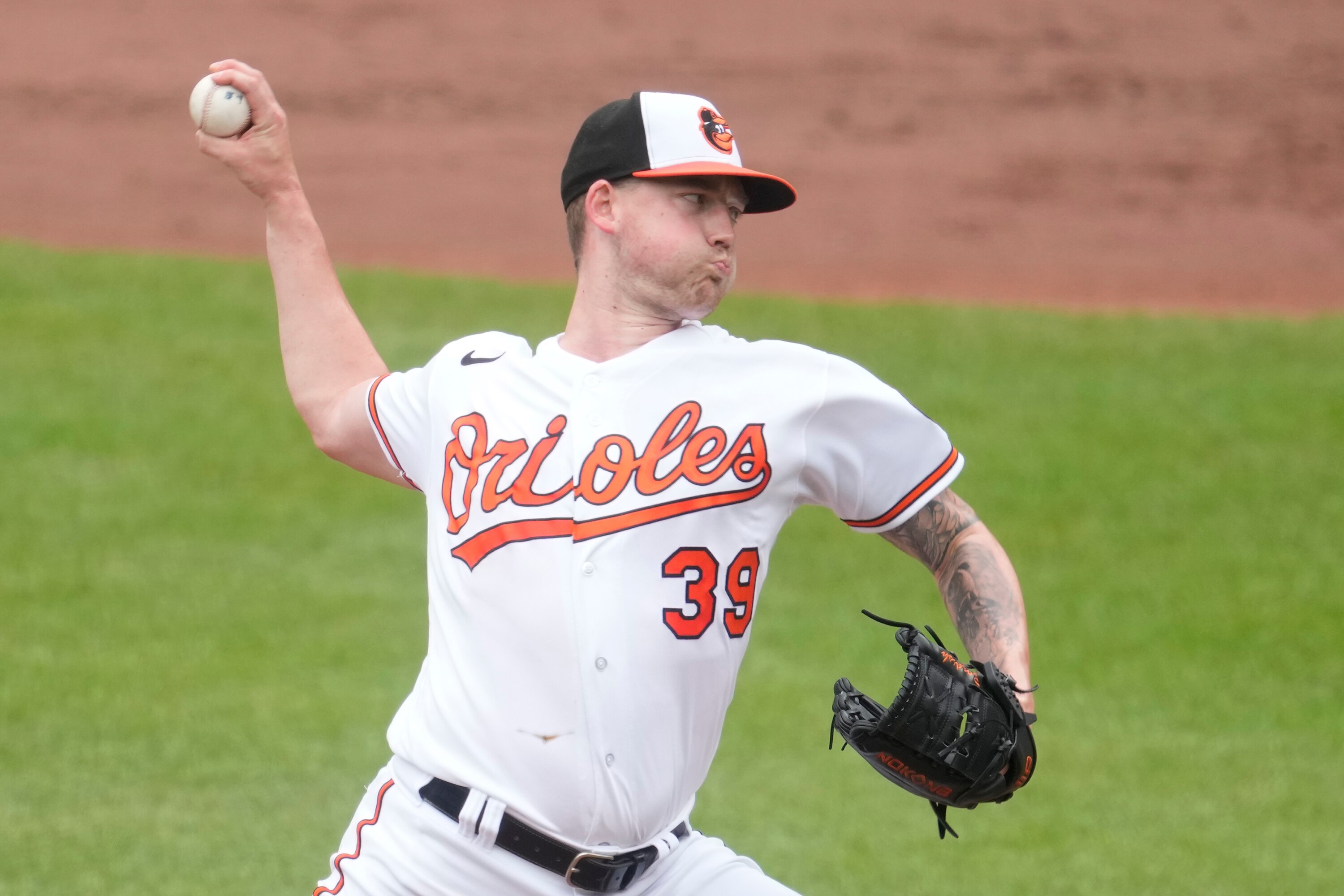 Kyle Bradish #39 of the Baltimore Orioles pitches in the second inning against the Miami Marlins at Oriole Park at Camden Yards on July 16, 2023 in Baltimore.
