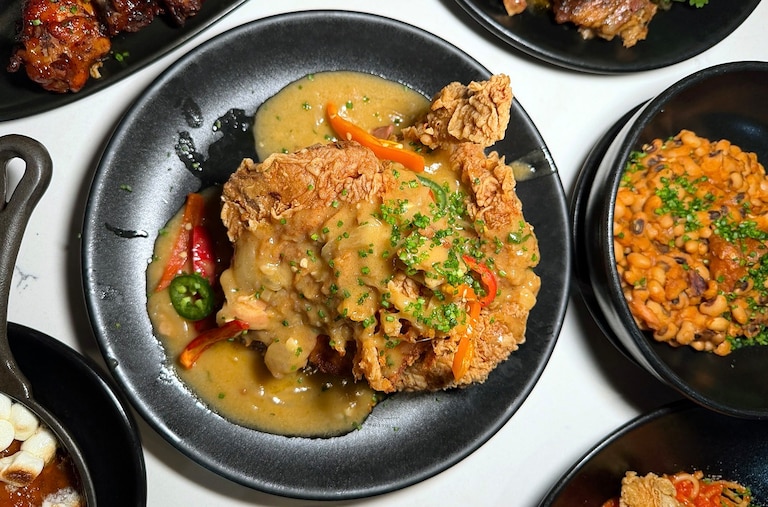 Smothered Pork Chops at BLK Swan.
