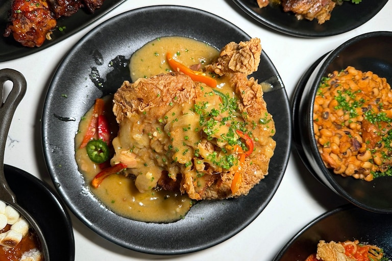 Smothered Pork Chops at BLK Swan.