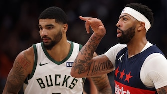 WASHINGTON, DC - OCTOBER 21: Anthony Davis #23 of the Washington Wizards celebrates a three-pointer in front of Kel'el Ware #9 of the Milwaukee Bucks during the first half at Capital One Arena on October 21, 2026 in Washington, DC. NOTE TO USER: User expressly acknowledges and agrees that, by downloading and or using this photograph, User is consenting to the terms and conditions of the Getty Images License Agreement. (Photo by Patrick Smith/Getty Images)