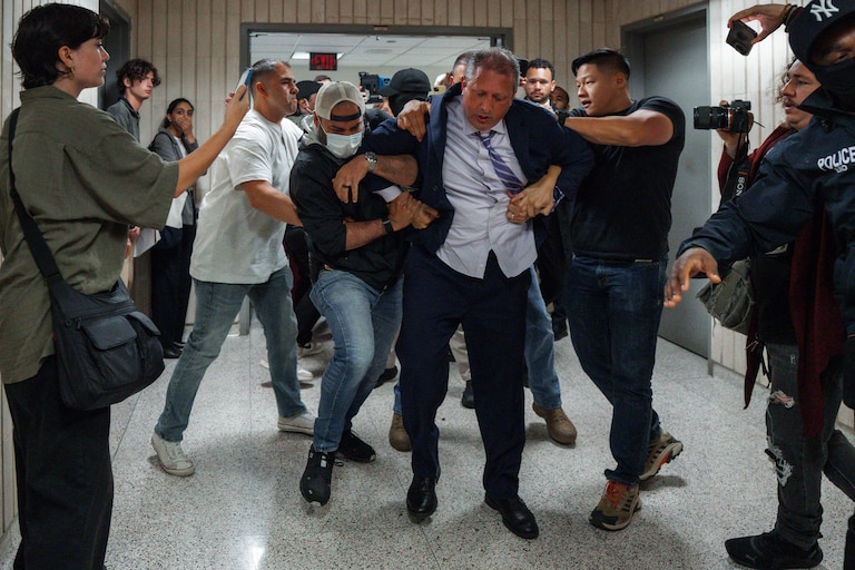 New York City Comptroller Brad Lander is placed under arrest by Immigration and Customs Enforcement (ICE) and FBI agents outside federal immigration court on Tuesday, June 17, 2025, in New York.