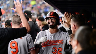 Christian Encarnacion-Strand celebrates with Orioles teammates after hitting a sacrifice fly to score Tyler O'Neill against the Tampa Bay Rays on Aug. 14.