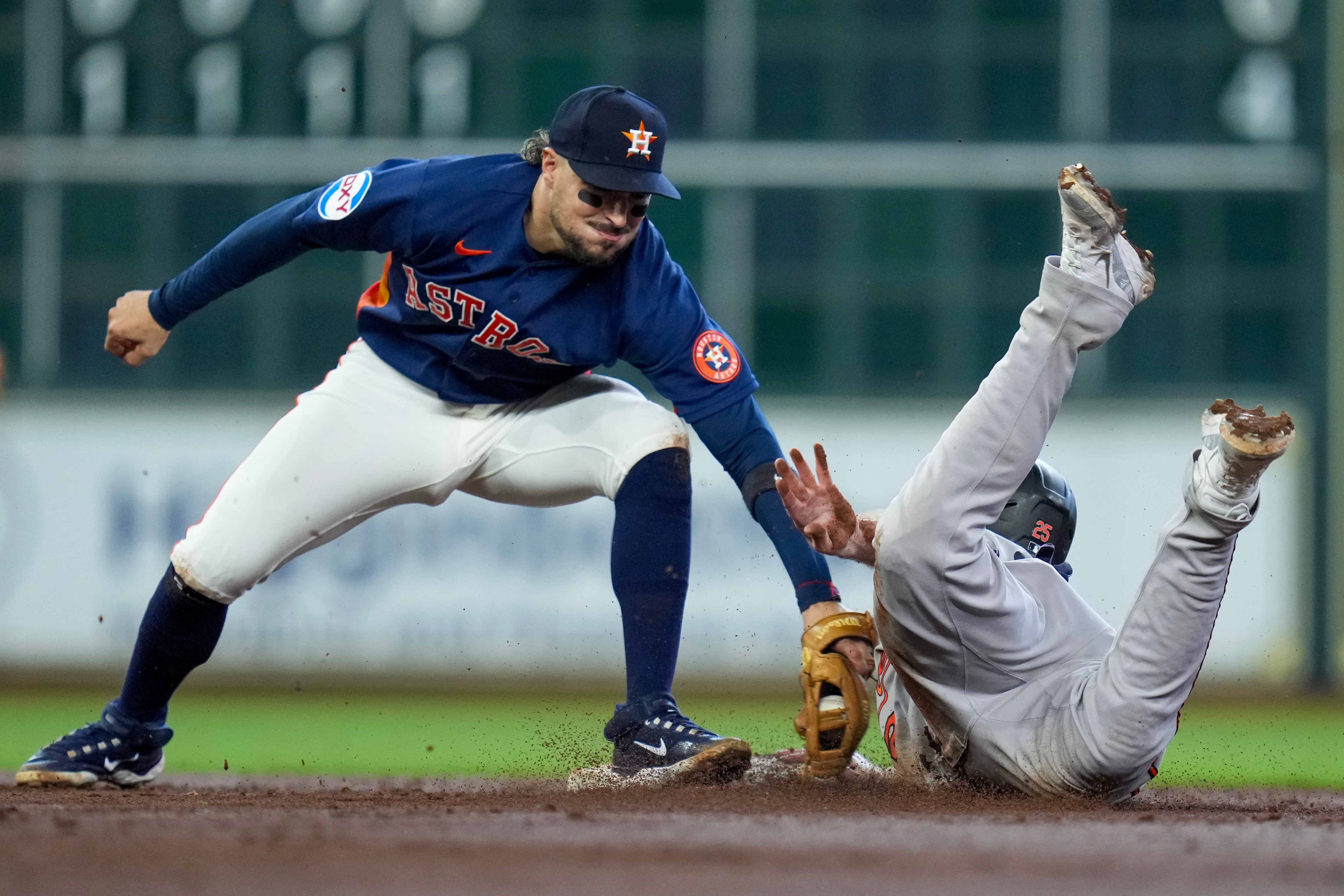 Pete Alonso steals second base as Astros second baseman Raynel Delgado applies a tag during the third inning. The play was part of a double steal on which Gunnar Henderson stole home.