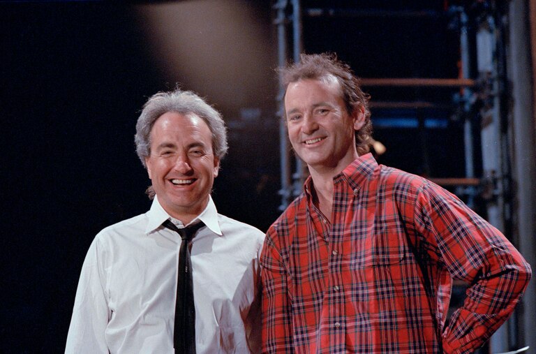 FILE - "Saturday Night Live" host Bill Murray, a former cast member, is pictured with producer Lorne Michaels, left, during rehearsals on March 19, 1987, in New York. (AP Photo/G. Paul Burnett, File)