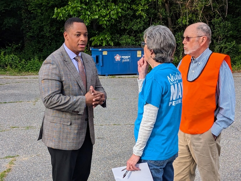 County Councilman Pete Smith talks with volunteers outside a voter forum on May 6 in Mayo. He's one of three major Democratic candidates for county executive.