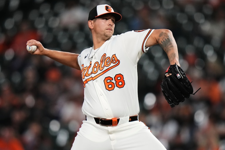 Baltimore Orioles pitcher Tyler Wells delivers during the ninth inning of a baseball game against the Texas Rangers, Monday, March 30, 2026, in Baltimore.