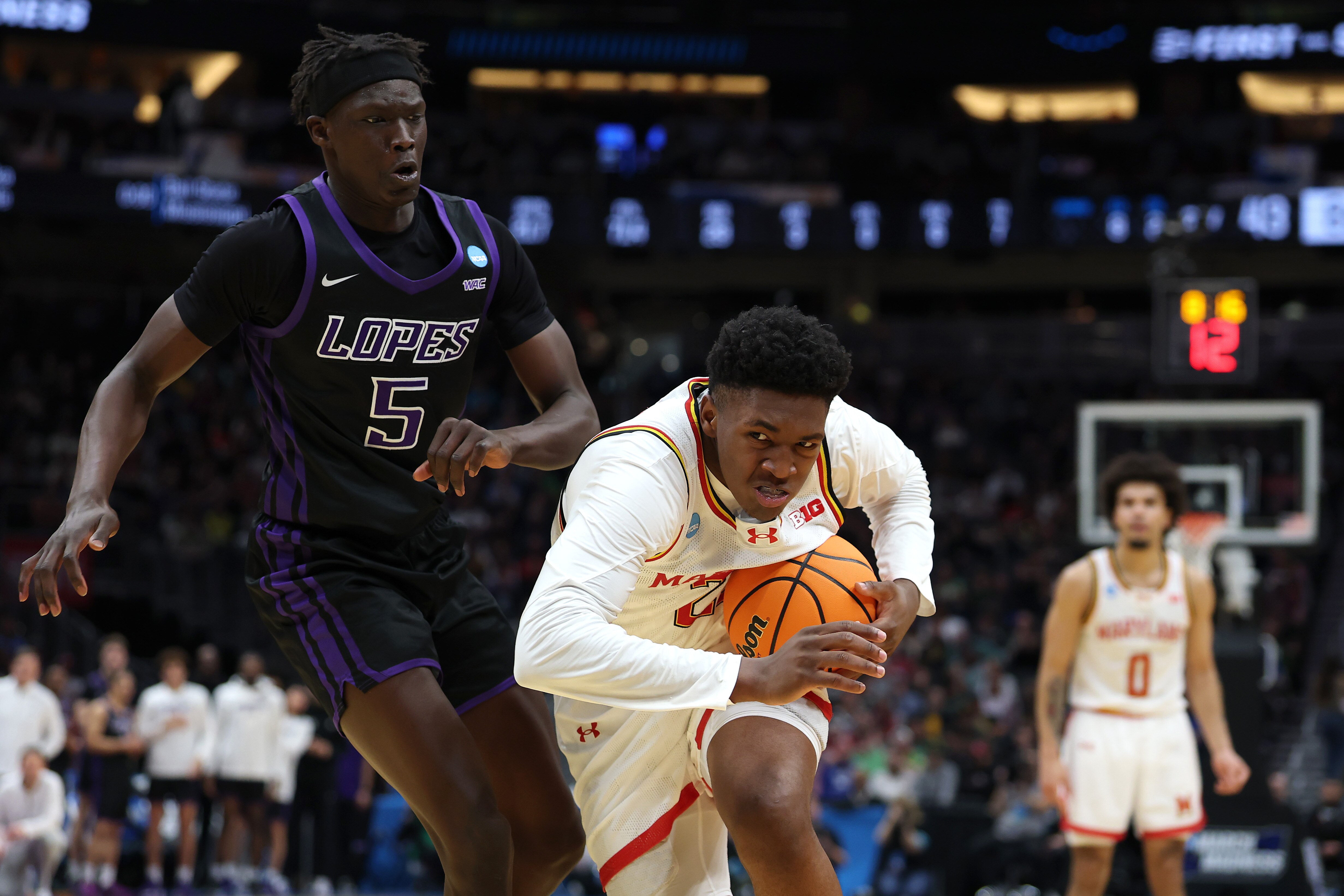Maryland freshman Derik Queen drives to the basket against Lok Wur of Grand Canyon during the Terrapins’ 81-49 win in the NCAA first round Friday.