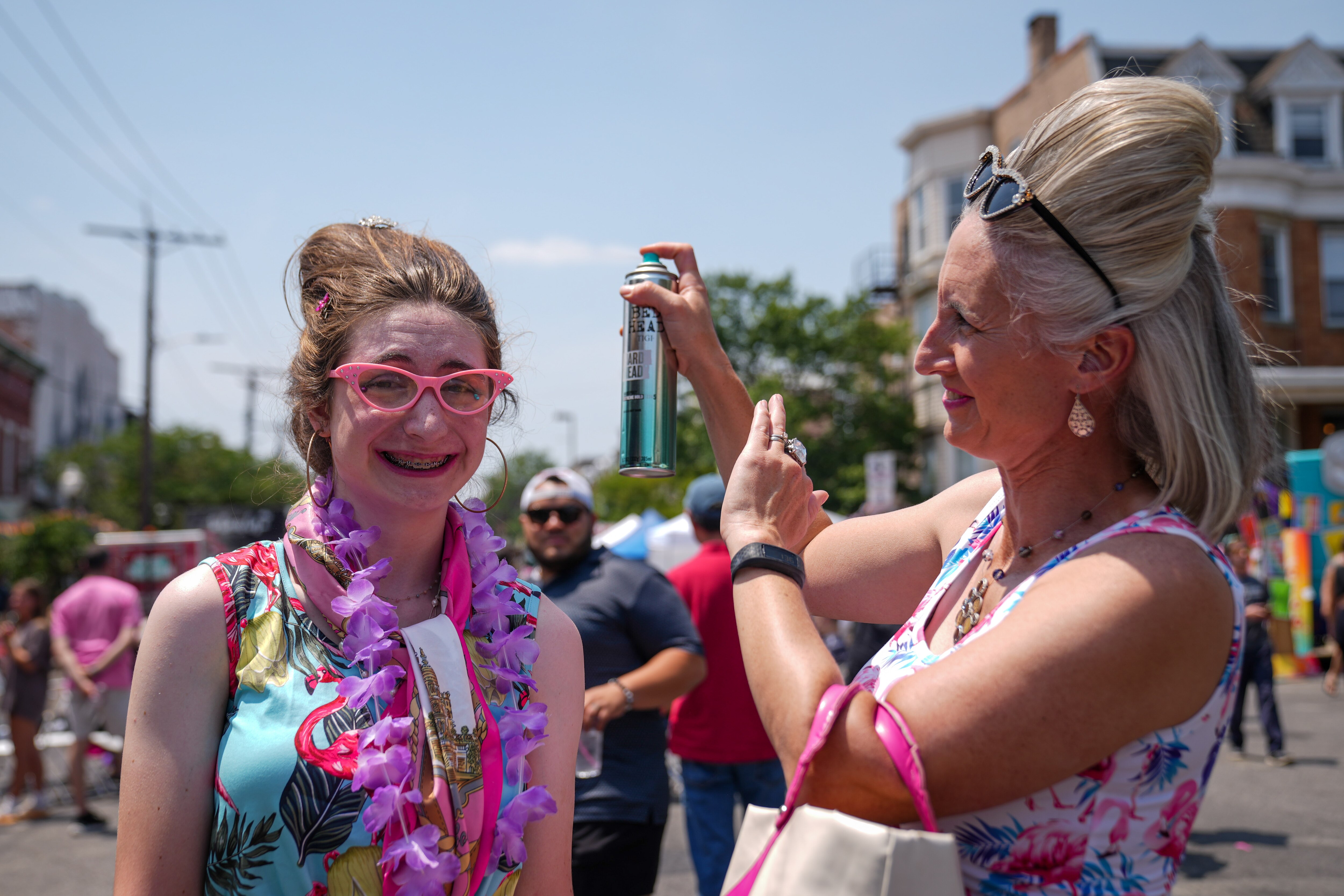 Julie Sharp, right, adds additional hairspray to Sydney Sharp’s hair at HONfest on Saturday, June 10, 2023.