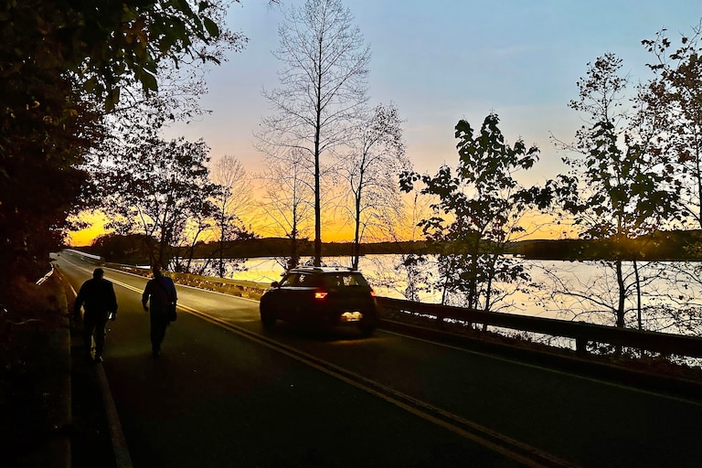 Retired astronautical engineer Paul Carr and local historian Josh Bell, bottom left, walk along the modern Loch Raven Drive bridge on Friday, Oct. 23, 2026.