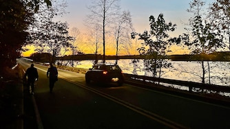 Retired astronautical engineer Paul Carr and local historian Josh Bell, bottom left, walk along the modern Loch Raven Drive bridge on Friday, Oct. 23, 2026.