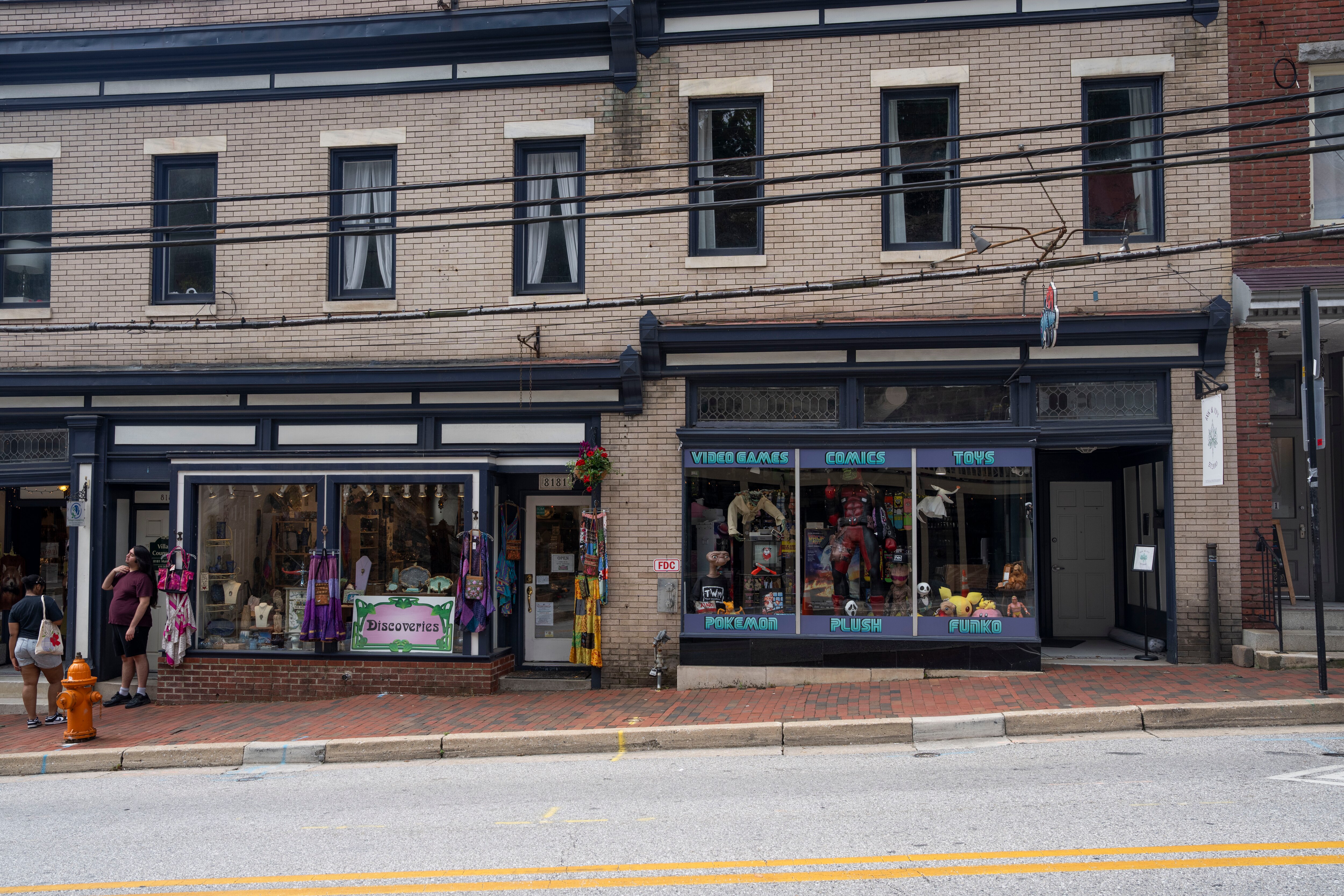 Businesses line historic Main Street in Ellicott City. Employees at Howard County’s smallest businesses are getting a raise thanks to a pandemic-era law.