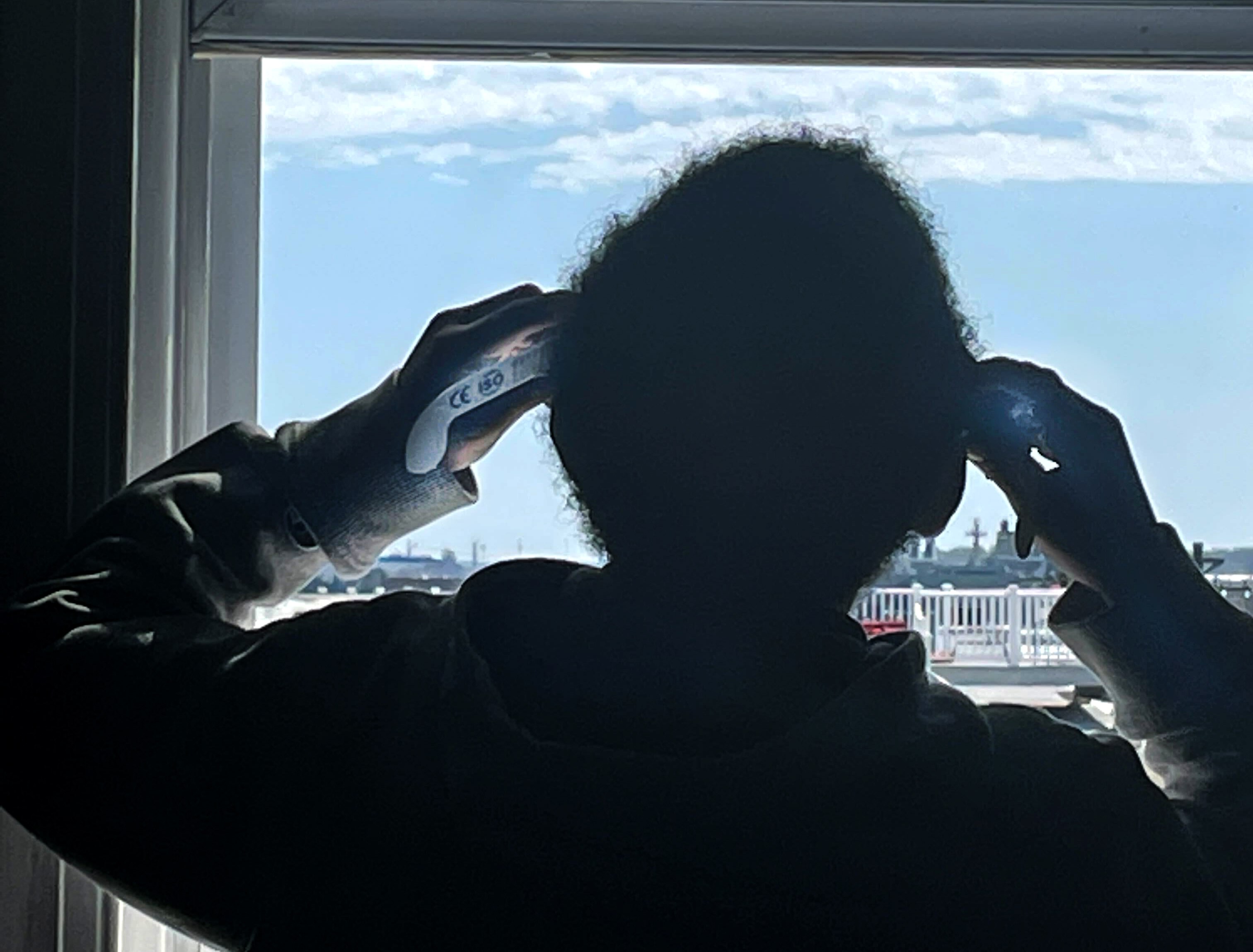 Leslie Streeter’s son watches the total eclipse that took place earlier this week.