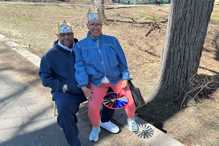 SATURDAY, MARCH 28, 2026 - Audrey and Charles Davis, a husband and wife from Odenton, who had “No Kings” taped onto the Burger King crowns they wore at the No Kings protest at Chrysalis at Merriweather Park at Symphony Woods in Columbia.