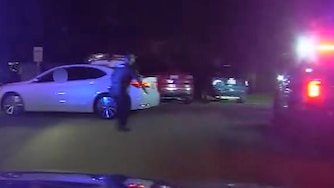 State officials release body camera footage of August fatal police shooting in Suitland, Maryland. Body camera footage of a fatal police shooting appears to show the officer placing himself in the path of the moving vehicle before backing up and firing his weapon at the driver.