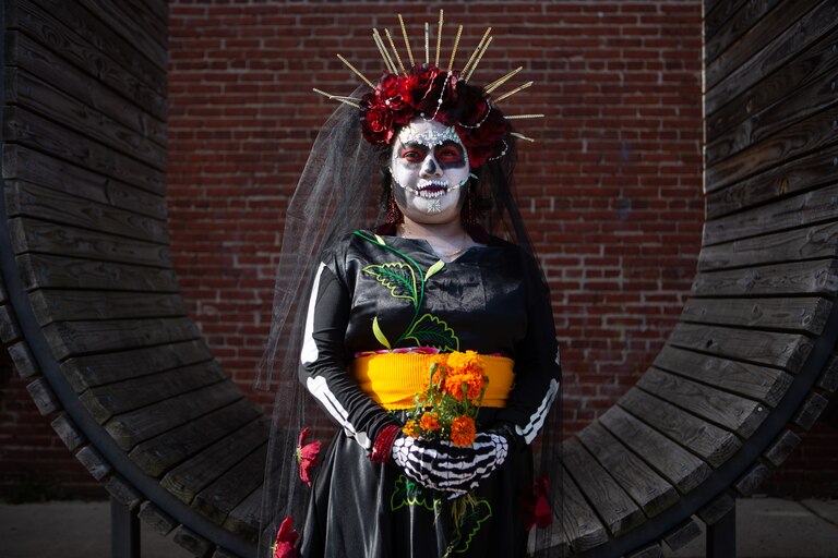 11/5/22 – Alondra Flores, a teacher with the Juventud Latina program, dresses in traditional Día de los Muertos attire as part of Creative Alliance's Día de Muertos Celebration on Saturday.