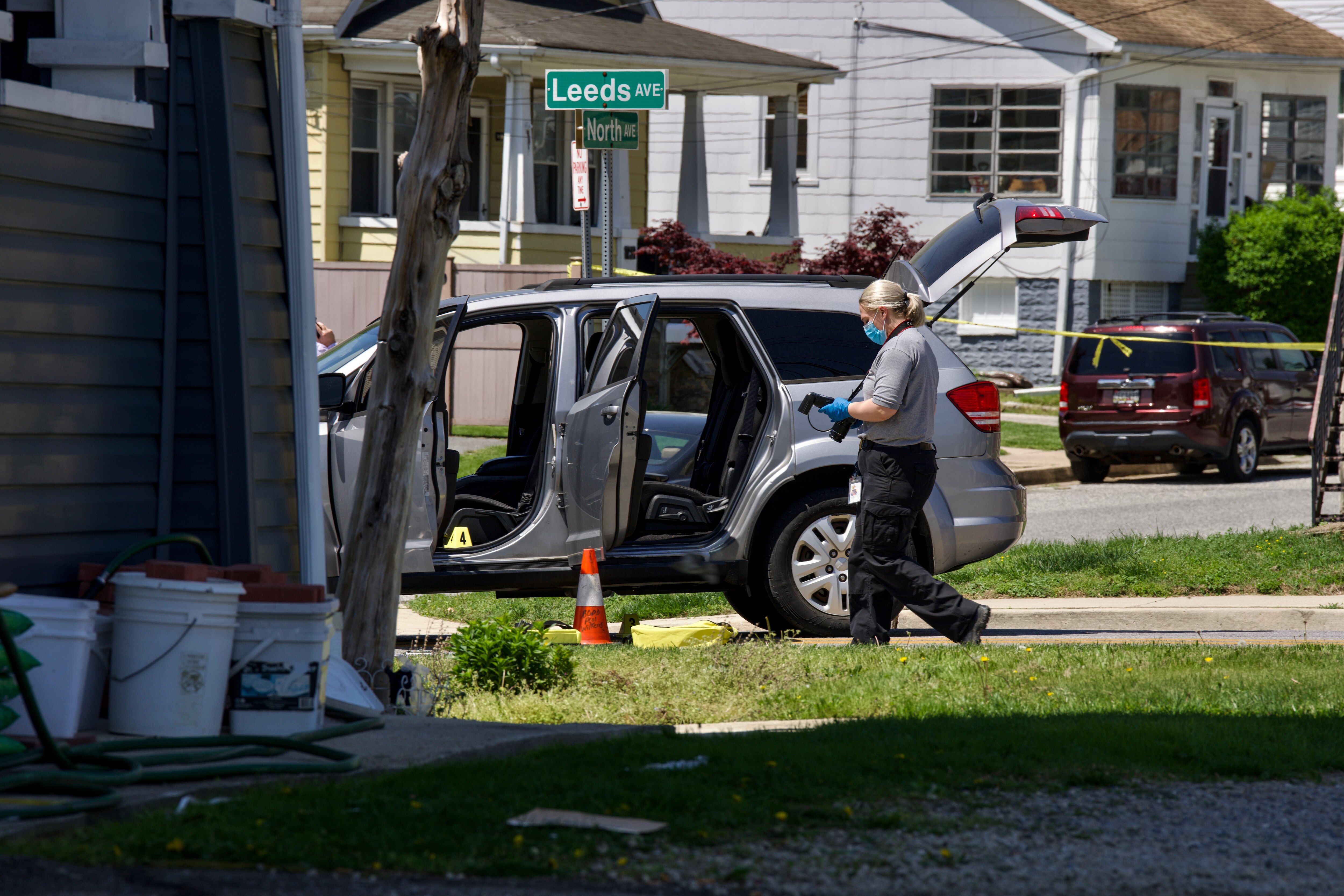 Law enforcement on Leeds Avenue in Arbutus investigate a shooting on Wednesday.