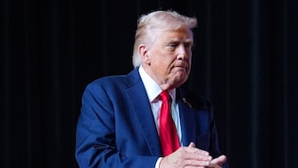 President Donald Trump walking off stage after speaking to a gathering of top U.S. military commanders at Marine Corps Base Quantico, Tuesday, Sept. 30, 2025, in Quantico, Va. (AP Photo/Evan Vucci)