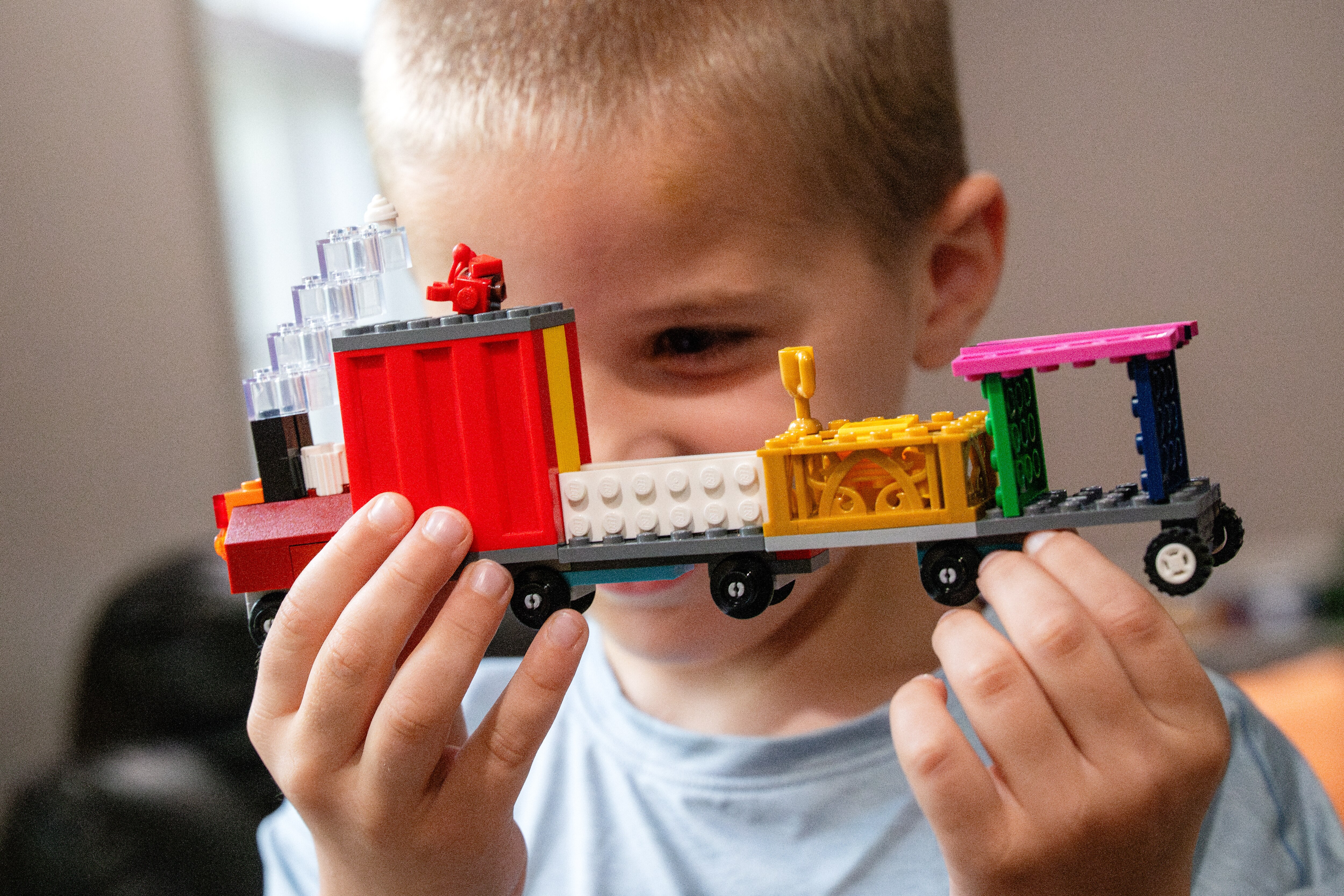 Calvin Coble, 6, shows off a portion of his Lego train submission to the B&O Railroad Museum’s Brick Build-Off Competition.