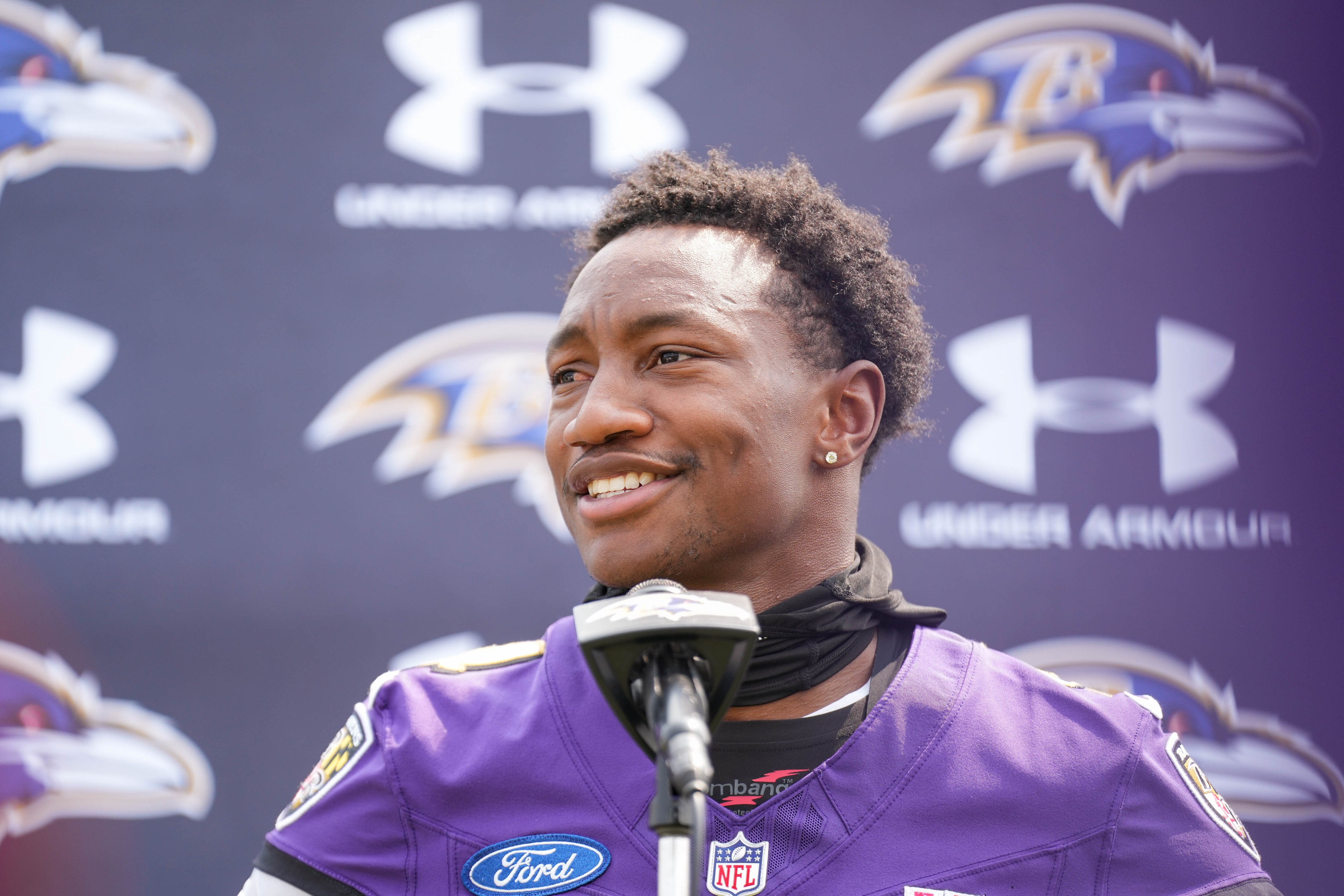 Wide receiver Zay Flowers (4) takes questions from reporters following the organized team activities Tuesday.