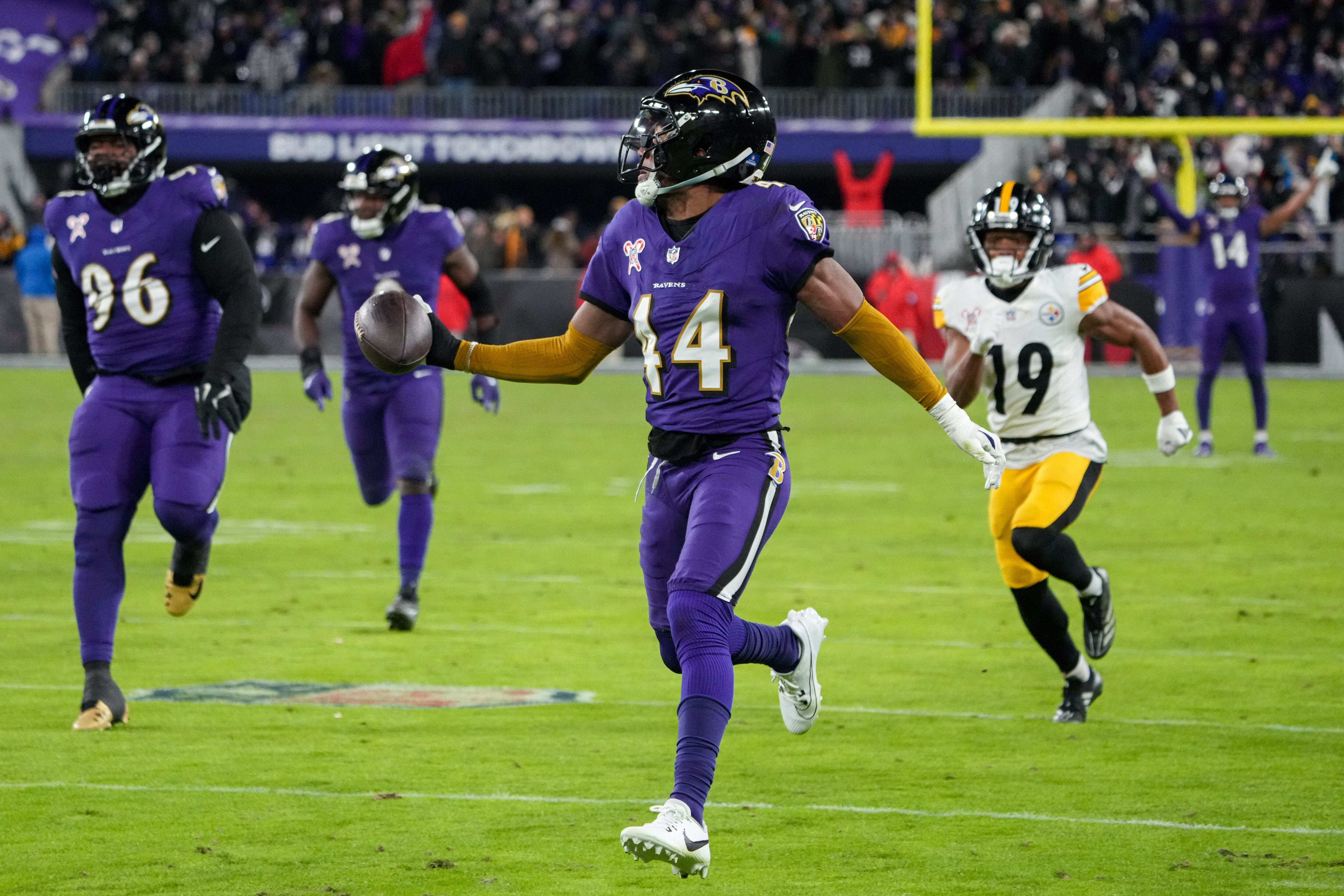 Ravens cornerback Marlon Humphrey returns an interception for a touchdown against the Steelers on Dec. 21.