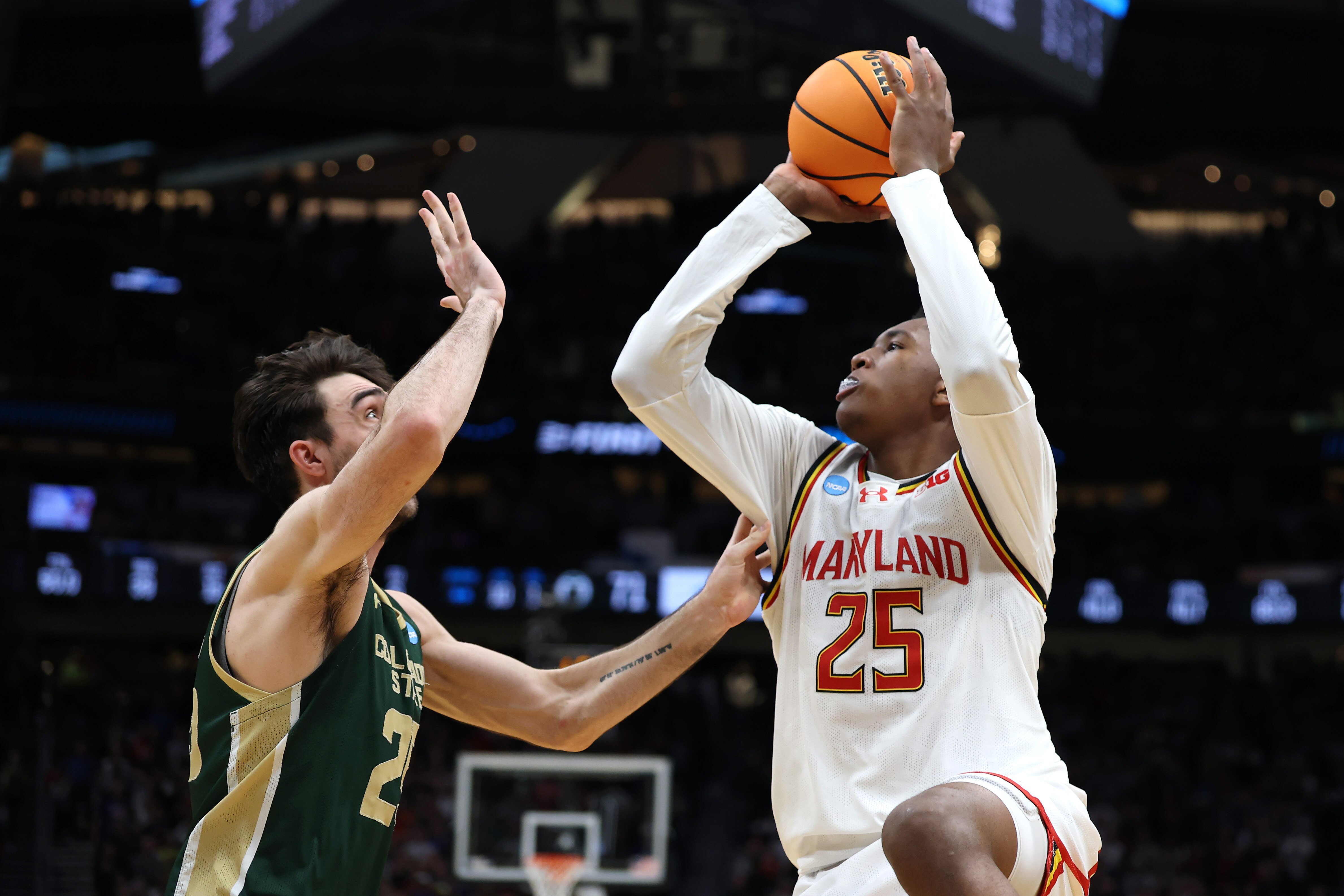Derik Queen of Maryland shoots over Ethan Morton of Colorado State on his buzzer-beating bank shot that sent the Terps to the NCAA Sweet 16.
