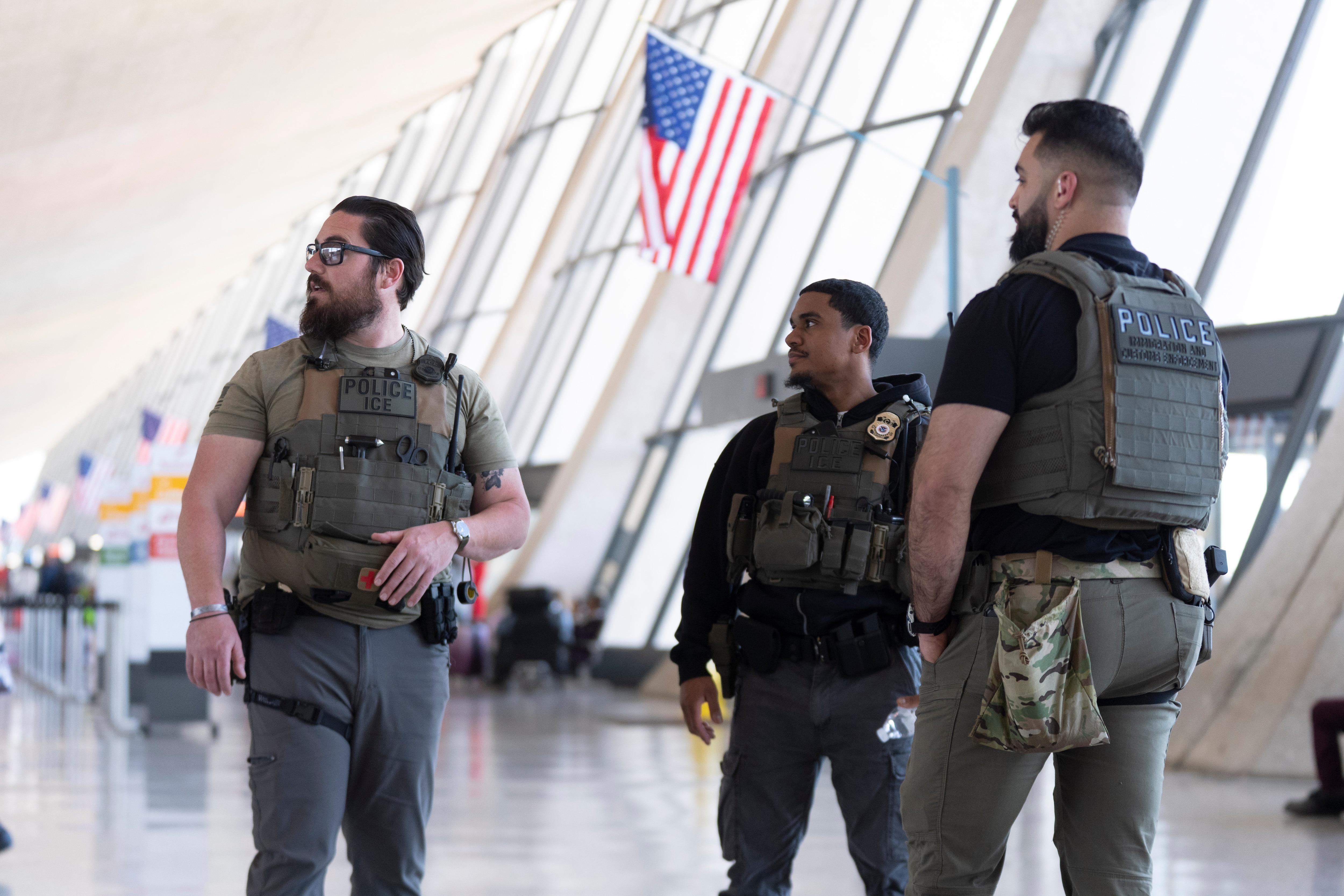 U.S. Immigration and Customs Enforcement's (ICE) agents patrol around the Washington Dulles International Airport, in Chantilly, Va., Tuesday, March 24, 2026. (AP Photo/Manuel Balce)