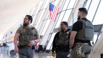 U.S. Immigration and Customs Enforcement's (ICE) agents patrol around the Washington Dulles International Airport, in Chantilly, Va., Tuesday, March 24, 2026. (AP Photo/Manuel Balce)