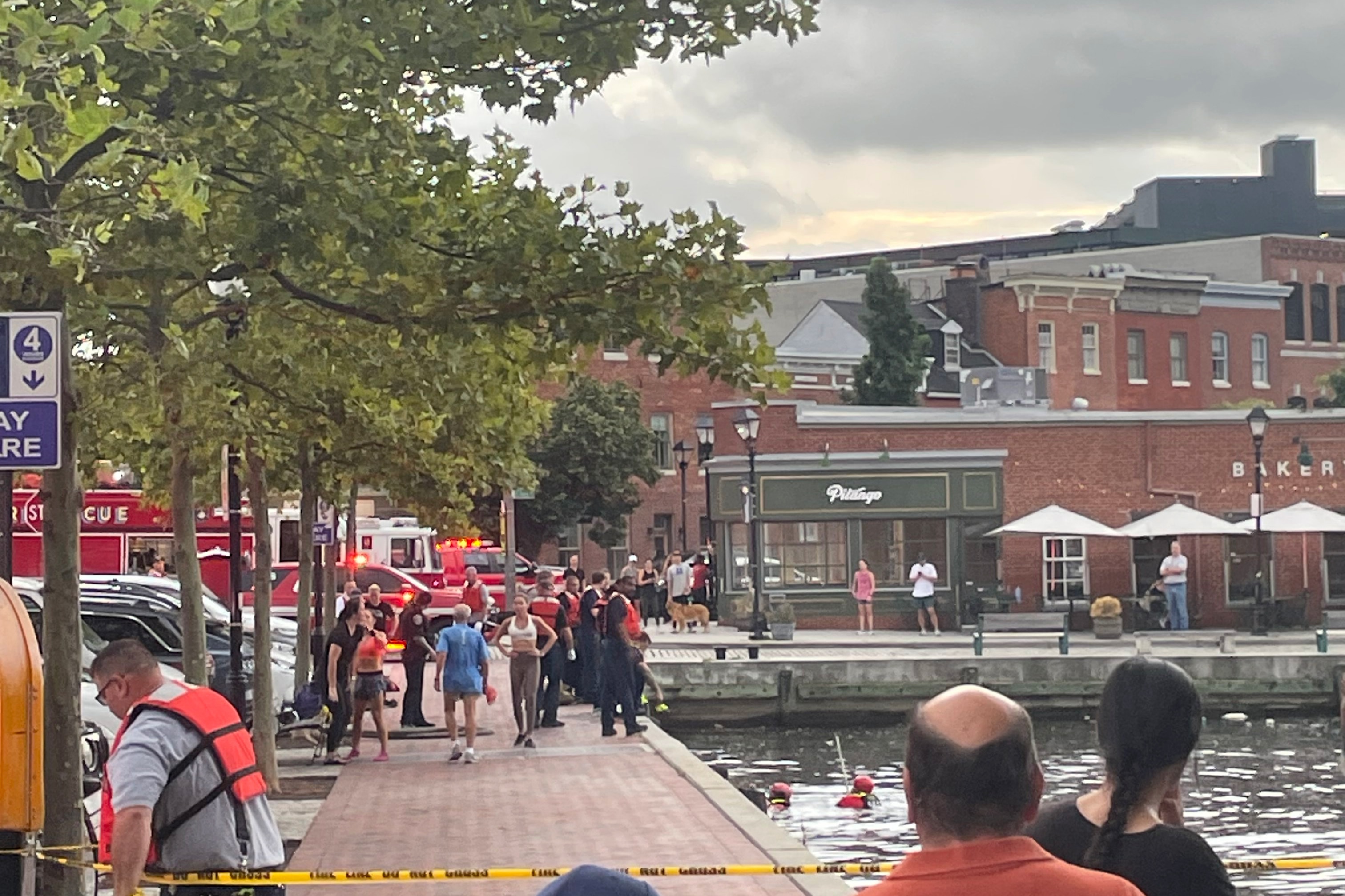Baltimore fire crews pulled a man from the water near South Ann and Thames streets around 7 a.m. Wednesday. The man was taken to an area hospital.