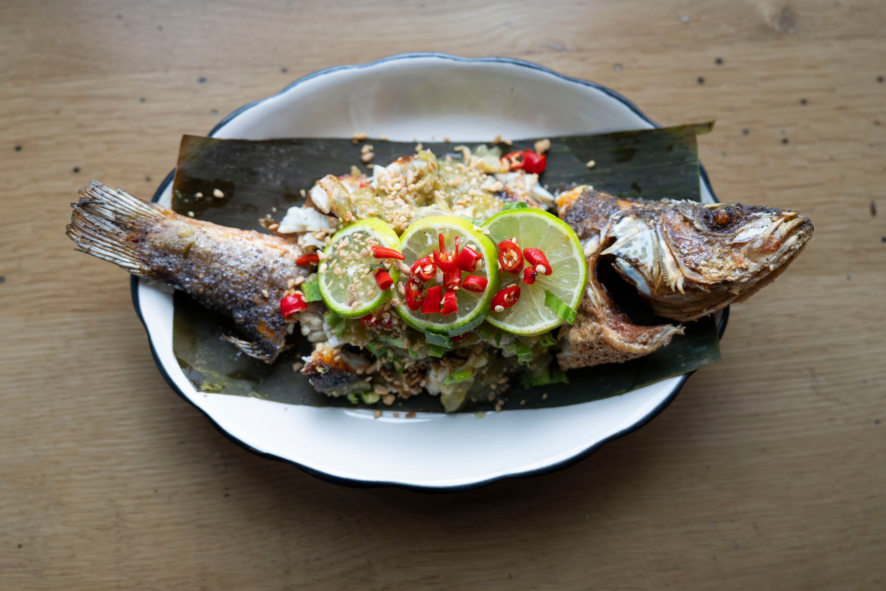 Hand-pulled fried branzino features Yunnan chili flakes and lime sauce at Water Song Yunnan Kitchen restaurant in Federal Hill.
