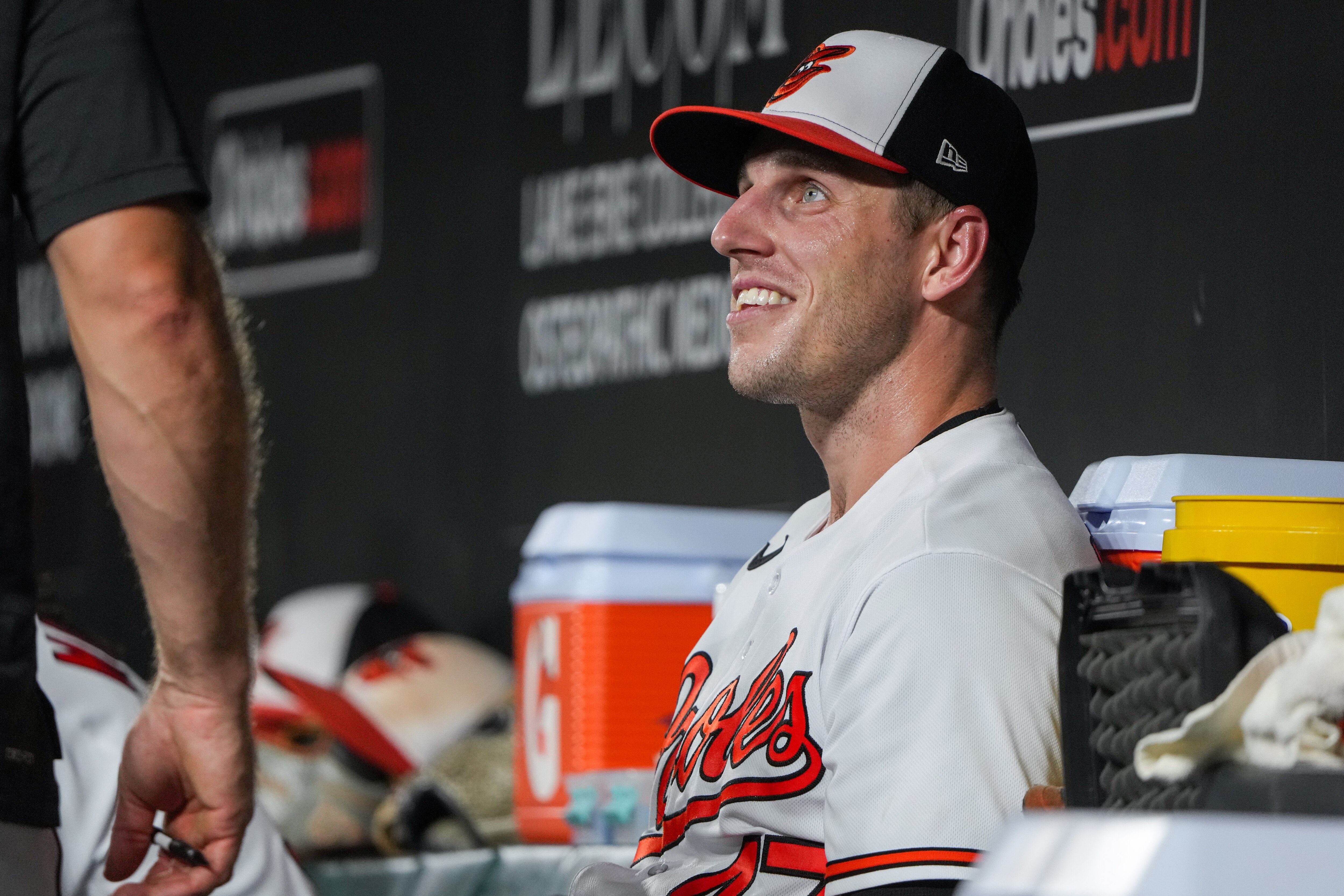 Baltimore Orioles starting pitcher John Means (47) talks with teammates in the dugout during a baseball game against the St. Louis Cardinals on Tuesday, Sept. 12, 2023.