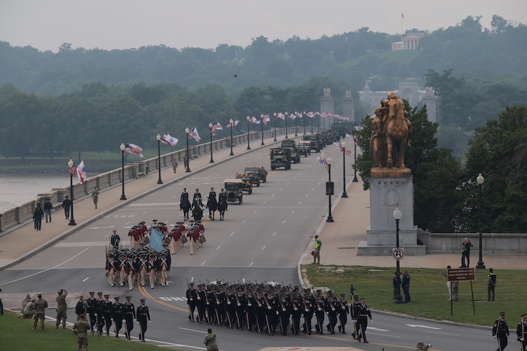Members of the U.S Army cross Arlington Memorial Bridge to start the parade down Constitution Avenue marking the 250th birthday of the U.S. Army June 14, 2025 in Washington, D.C. The U.S. Army is marking its 250th birthday with a military parade including roughly 6,600 troops, 150 vehicles, and over 50 aircraft. The parade, which coincides with President Donald Trump's 79th birthday, is designed to tell the history of the Army.