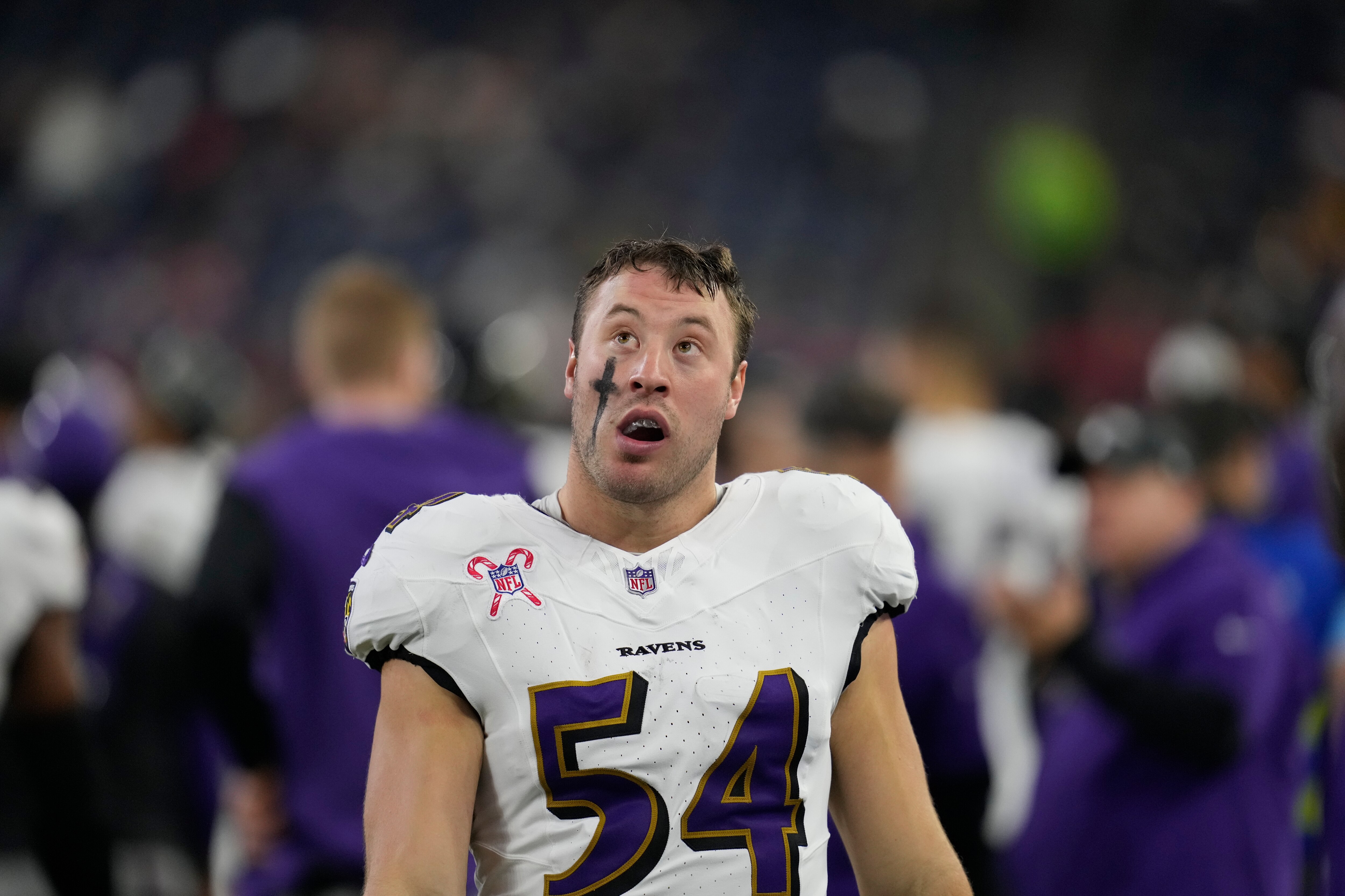 Baltimore Ravens linebacker Kristian Welch looks up at the scoreboard during an NFL football game against the Houston Texans Wednesday, Dec. 25, 2024, in Houston. (AP Photo/David J. Phillip)