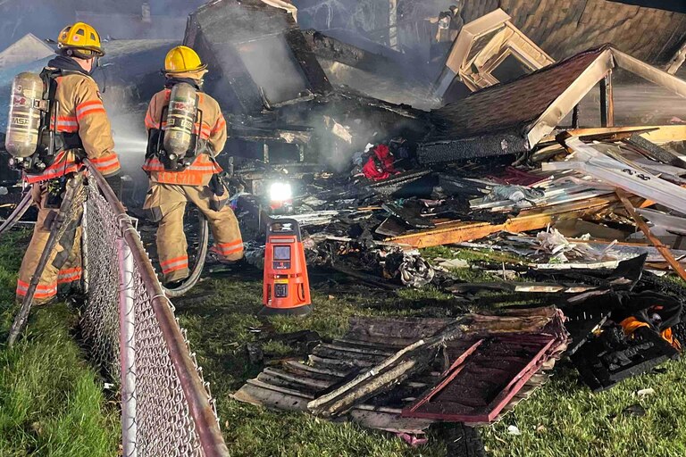 Baltimore County fire officials said they arrived in the Essex community late Saturday night and found a home engulfed by fire.