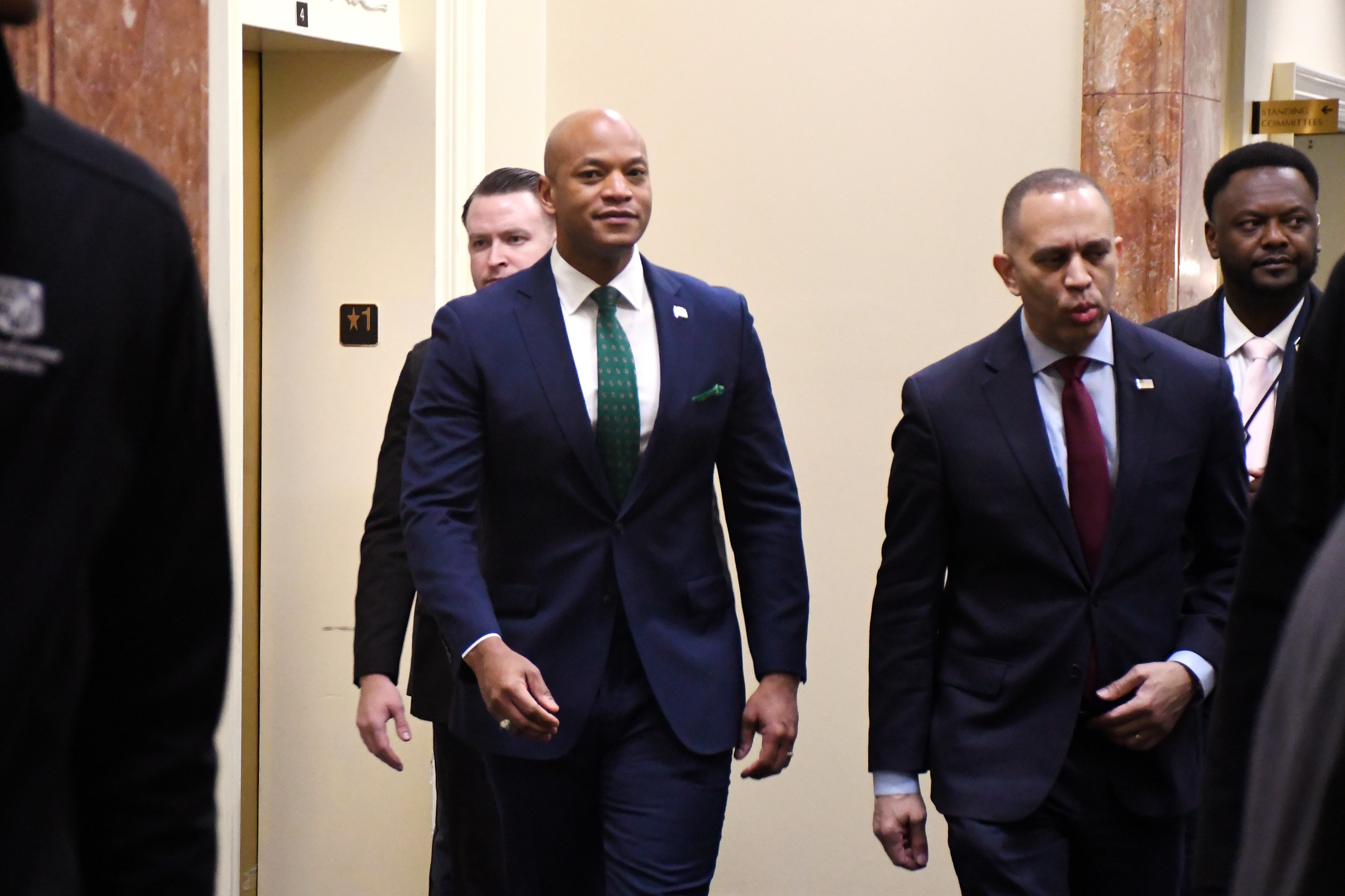 FEBRUARY 18, 2026 - Maryland Gov. Wes Moore and U.S. House Minority Leader Hakeem Jeffries arrive at the Maryland House of Delegates office building for a meeting with Democratic state delegates on Wednesday. Jeffries is pressing Maryland lawmakers to redraw the state's congressional districts to give Democrats a chance at sweeping all eight seats in this fall's election.