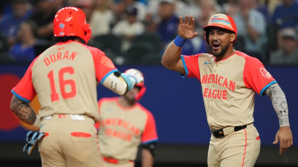 ARLINGTON, TEXAS - JULY 16: Jarren Duran #16 of the Boston Red Sox celebrates with Anthony Santander #25 of the Baltimore Orioles after hitting a two-run home run in the fifth inning against the National League during the 94th MLB All-Star Game presented by Mastercard at Globe Life Field on July 16, 2024 in Arlington, Texas. (Photo by Sam Hodde/Getty Images)