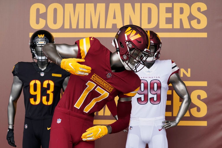 FILE - Washington Commanders jerseys are displayed at an event to unveil the NFL football team's new identity, Feb. 2, 2022, in Landover, Md. (AP Photo/Patrick Semansky, file)